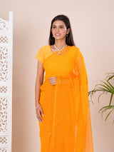 A yellow chiffon saree with a bandhani pattern