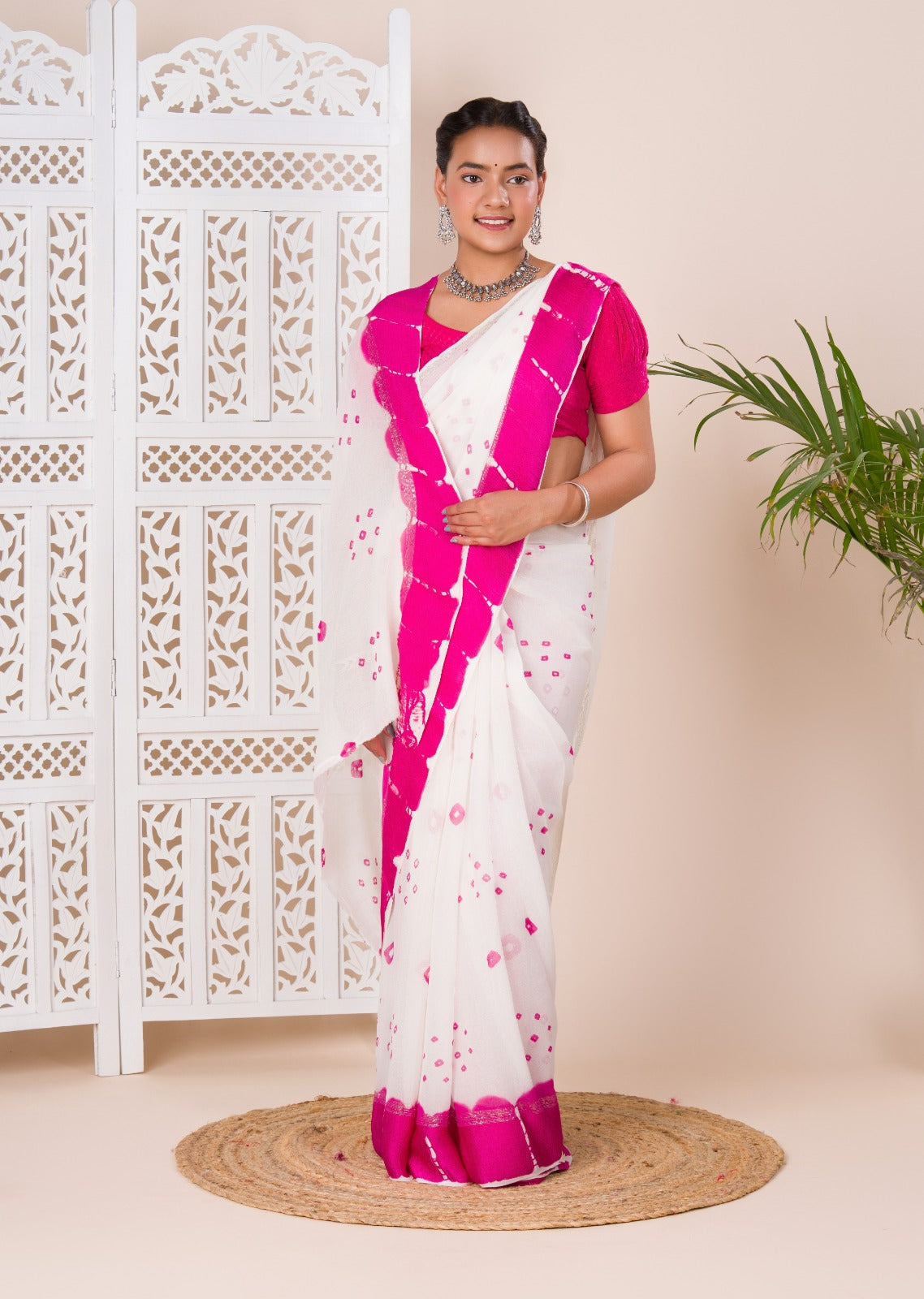 Georgette Gulti Bandhej Satin Patta Border Saree in white colour