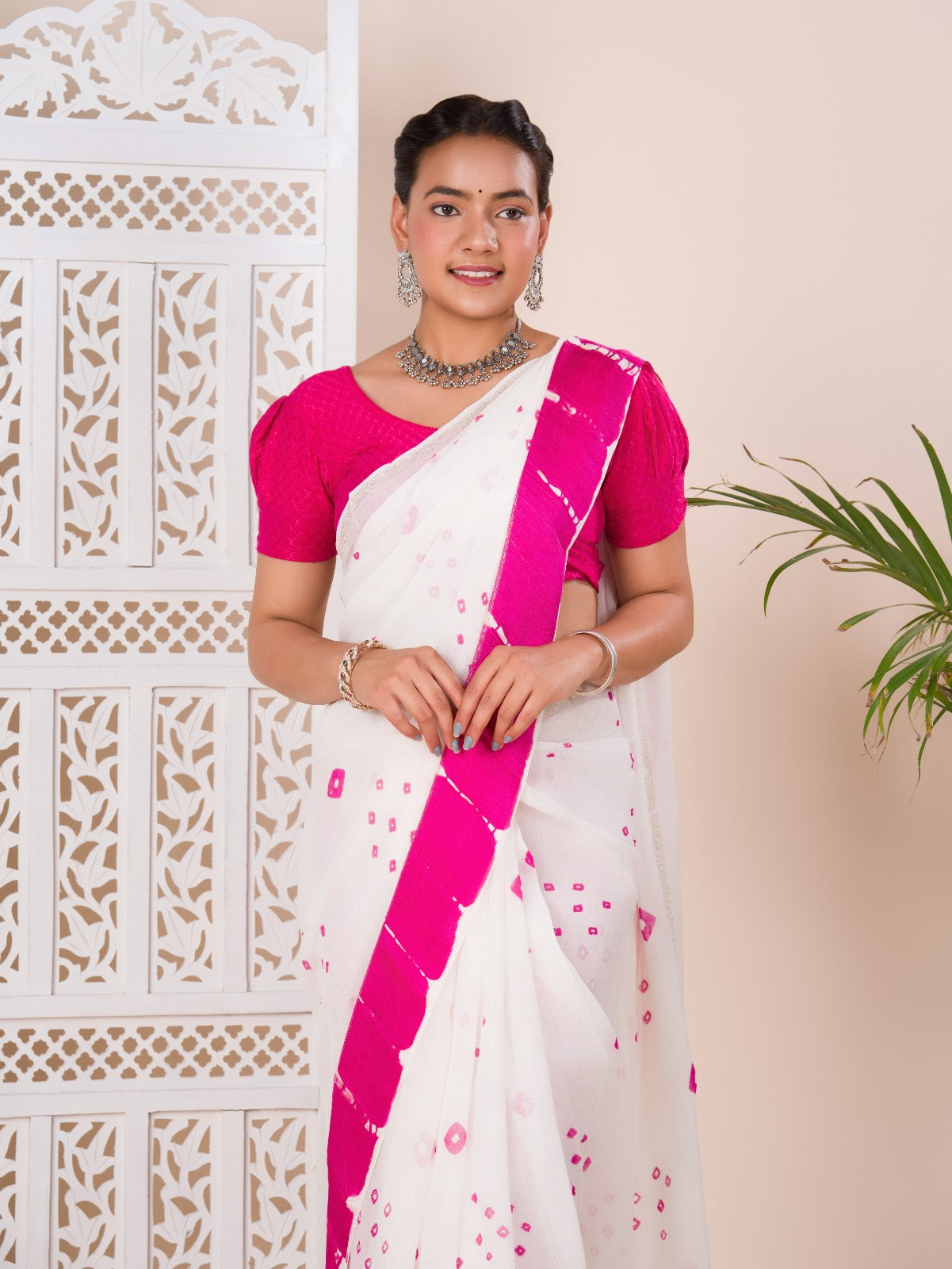 Georgette Gulti Bandhej Satin Patta Border Saree in white colour