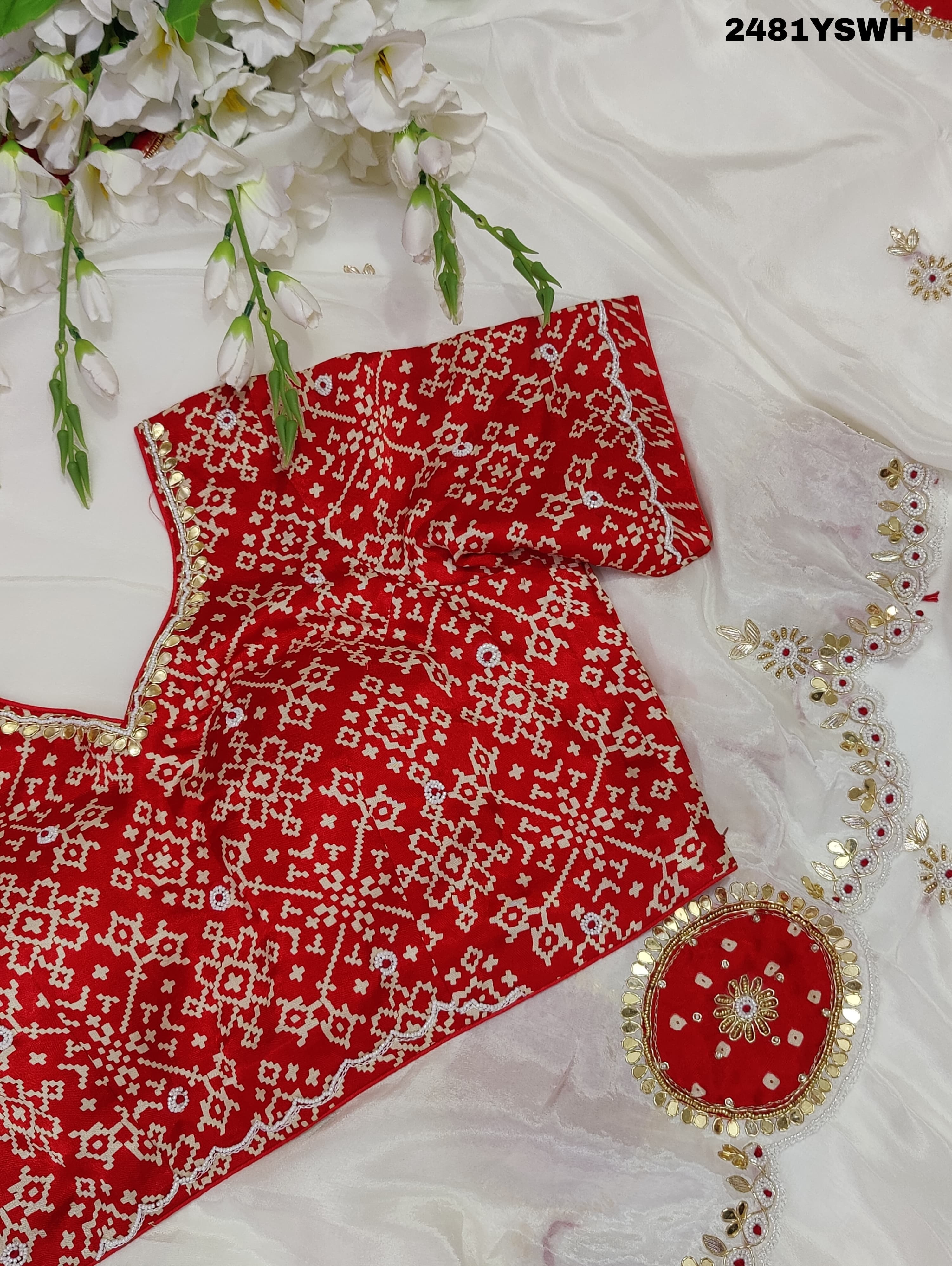 White chinon silk saree with red cutdana mirror work and white beads