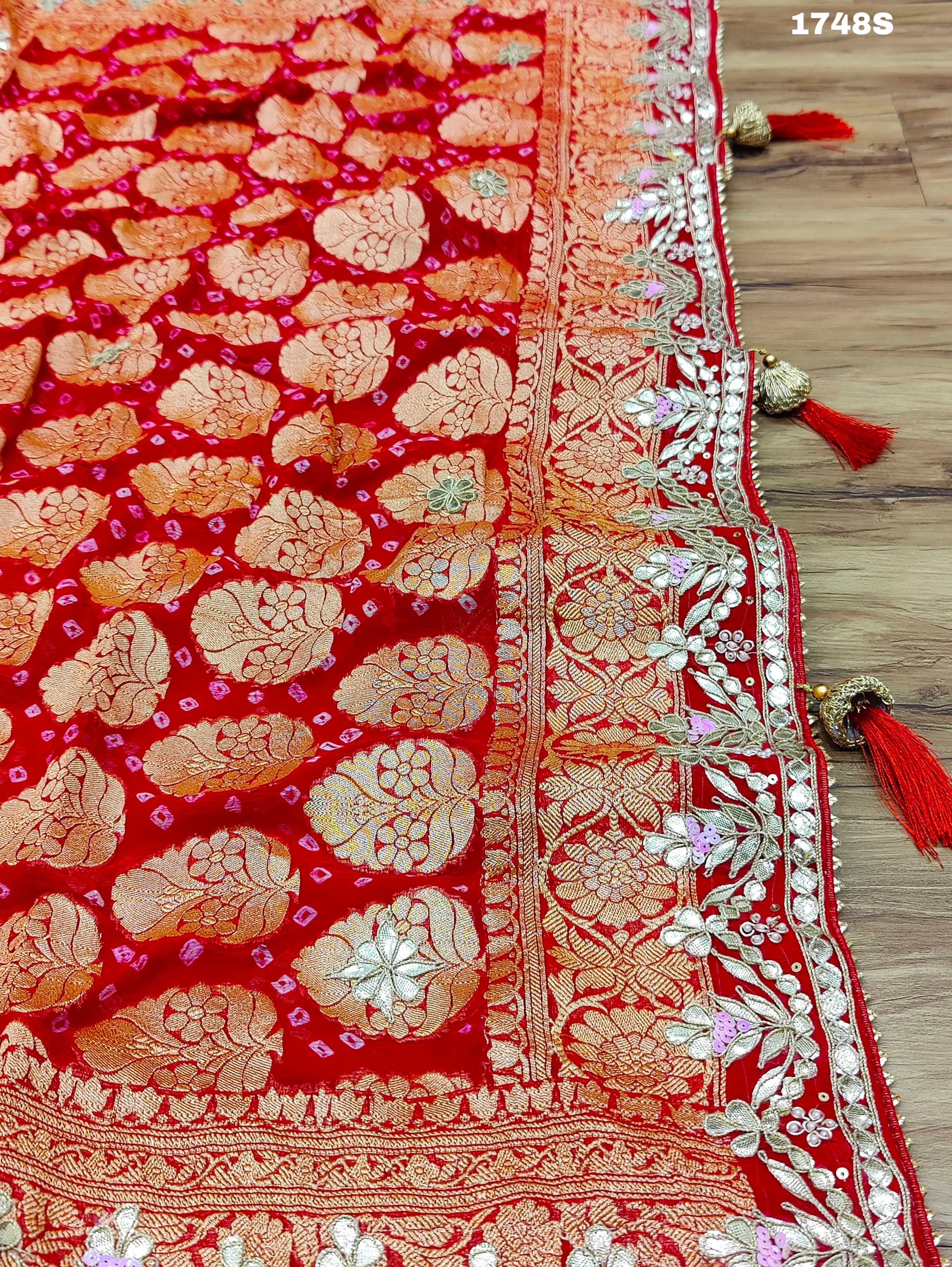 Neemzari Bandhej saree in traditional red color