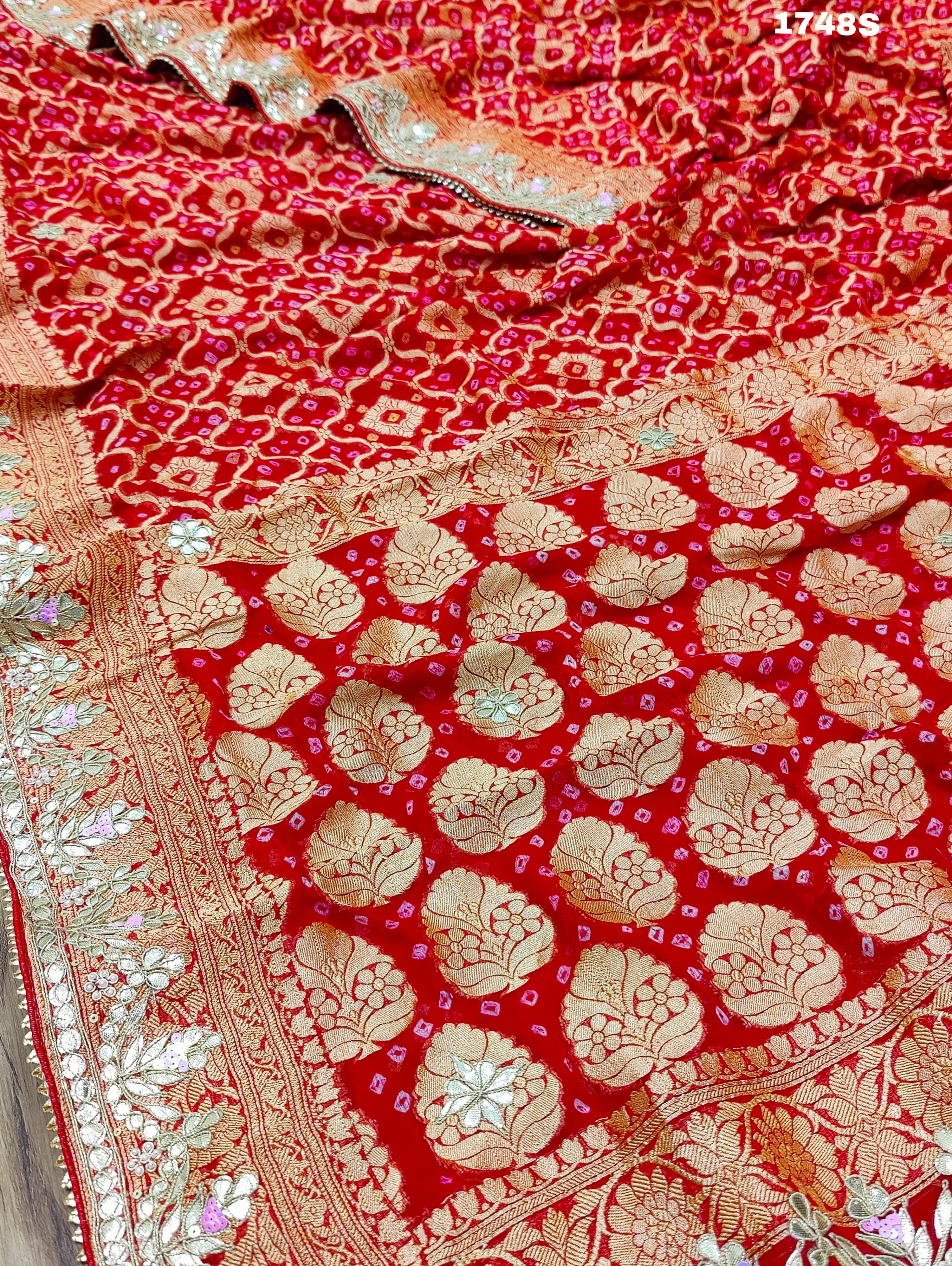 Neemzari Bandhej saree in traditional red color