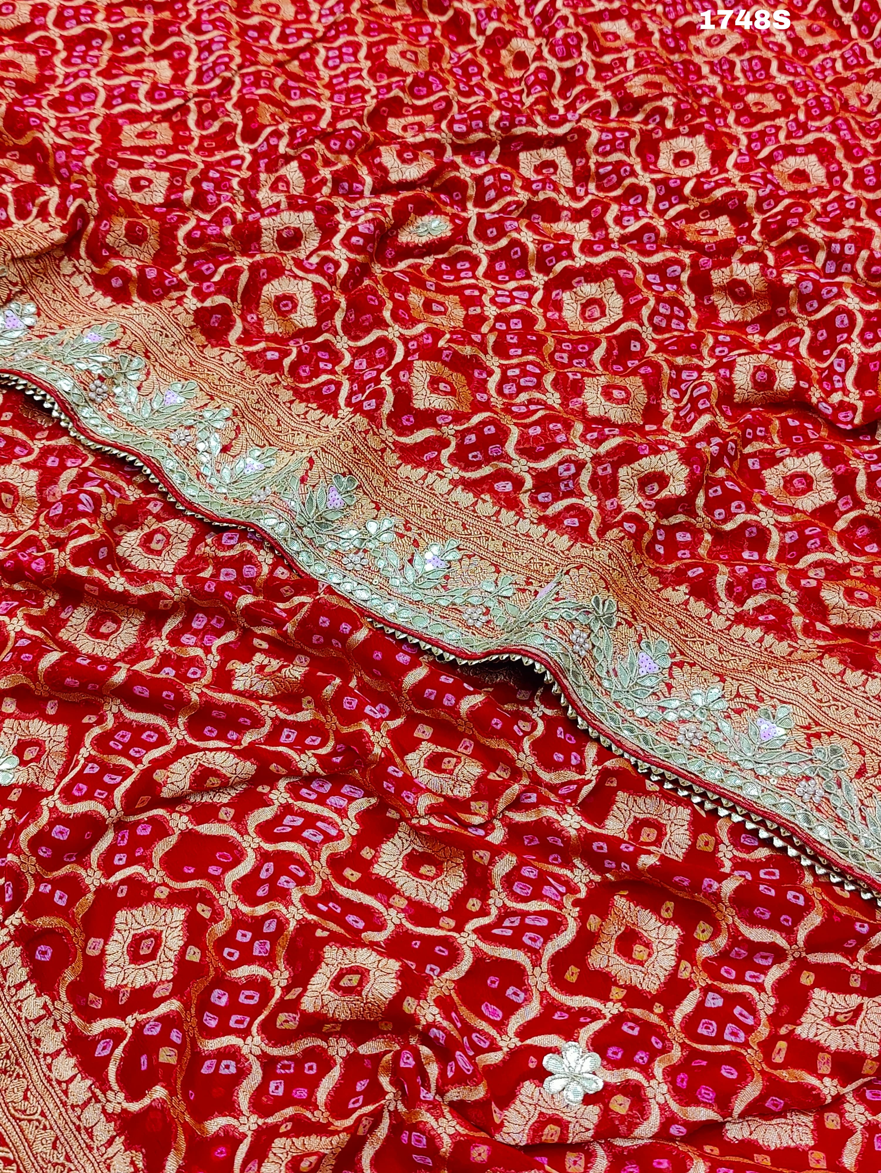 Neemzari Bandhej saree in traditional red color
