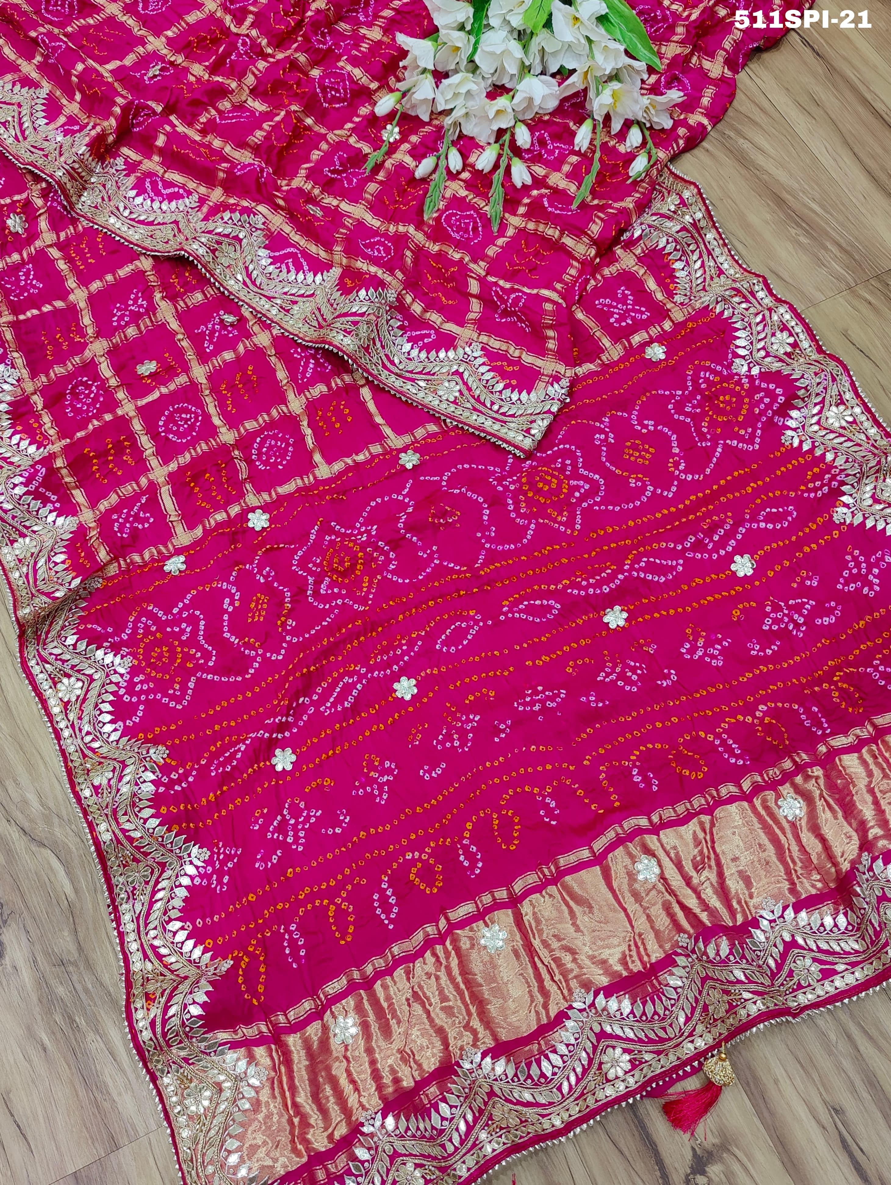 beautiful saree is made of soft Pure Gaji Silk with a traditional Bandhani style design