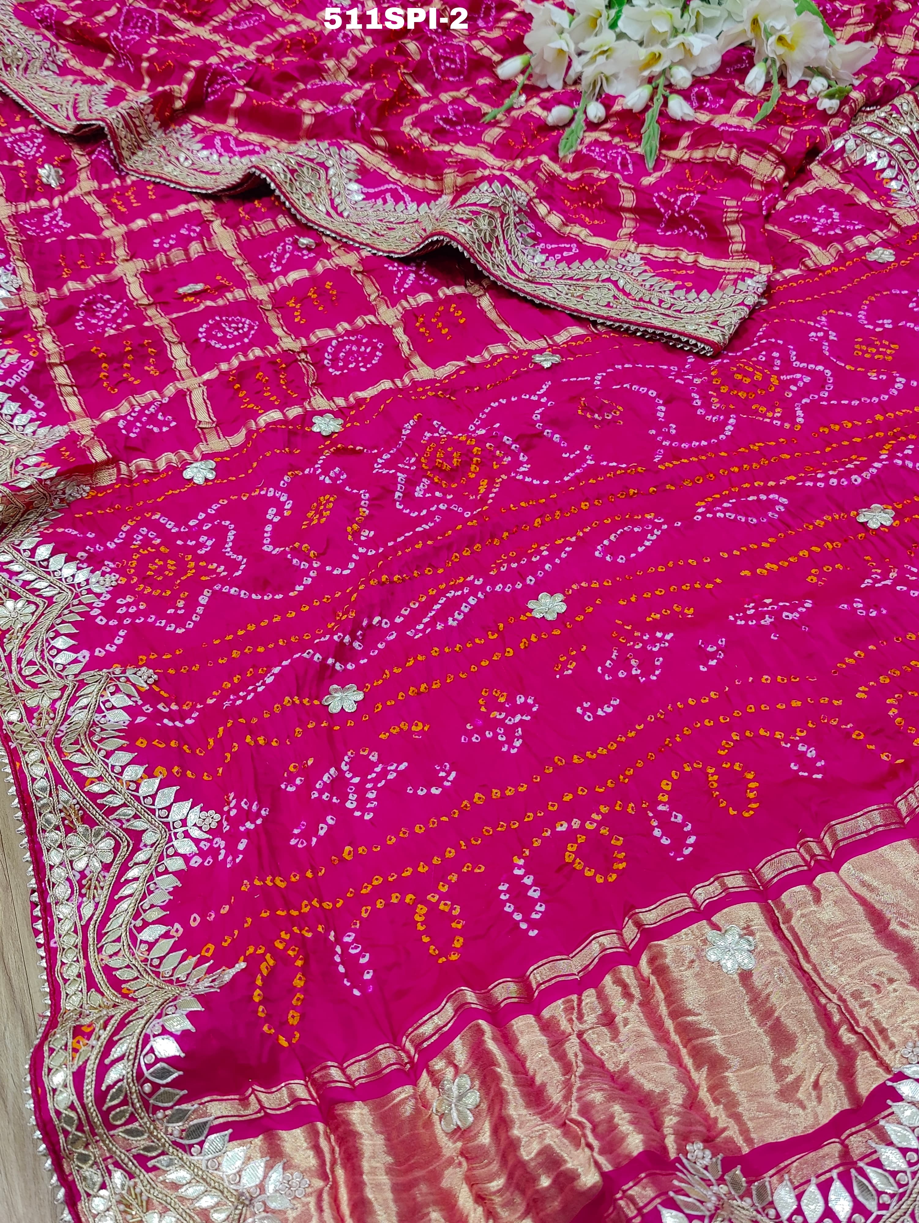 beautiful saree is made of soft Pure Gaji Silk with a traditional Bandhani style design