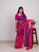 A pink and purple saree with a white pattern under 1000