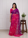 A pink and purple saree with a white pattern under 1000