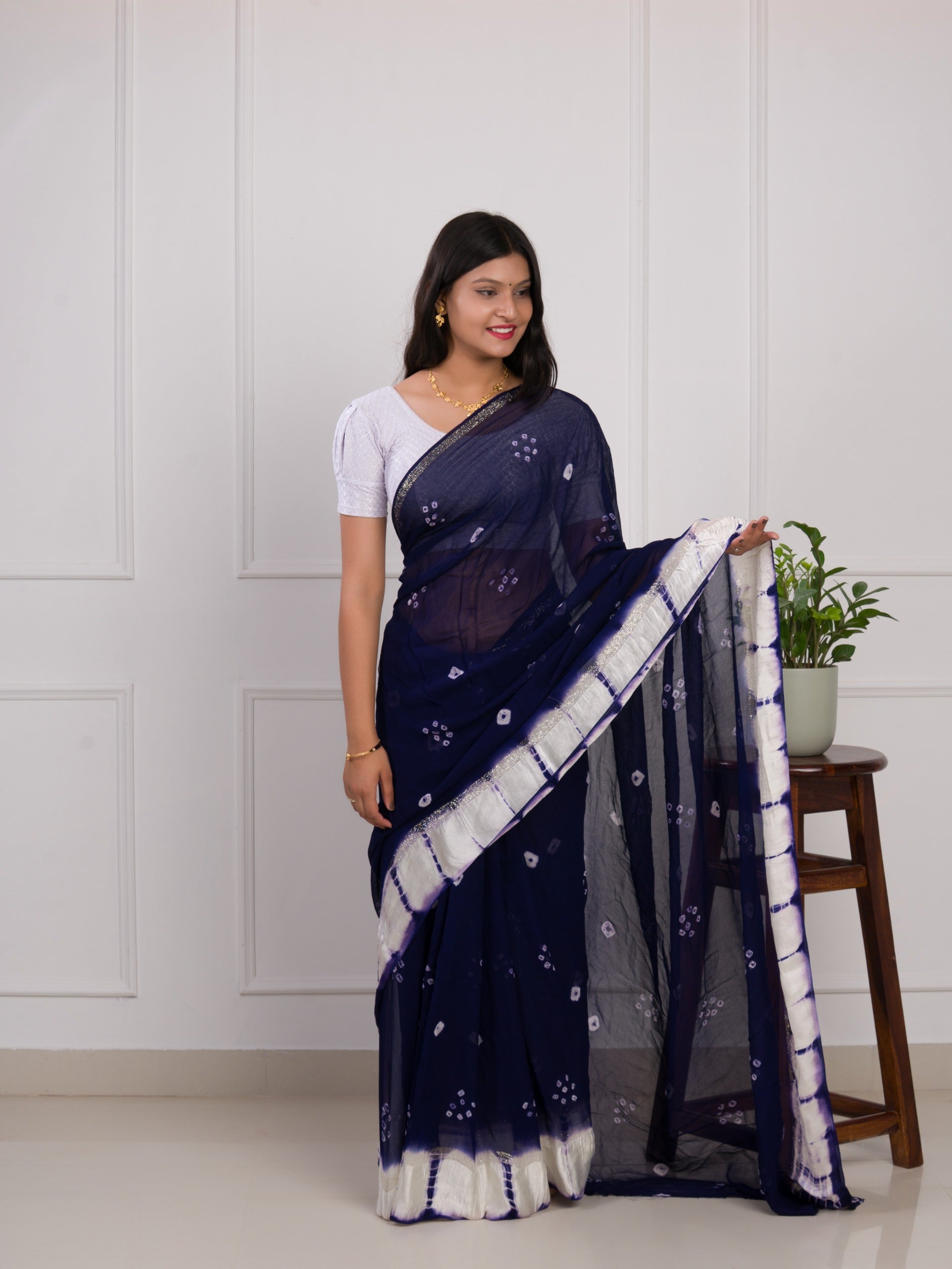 navy blue saree with white pattern with bandhani style