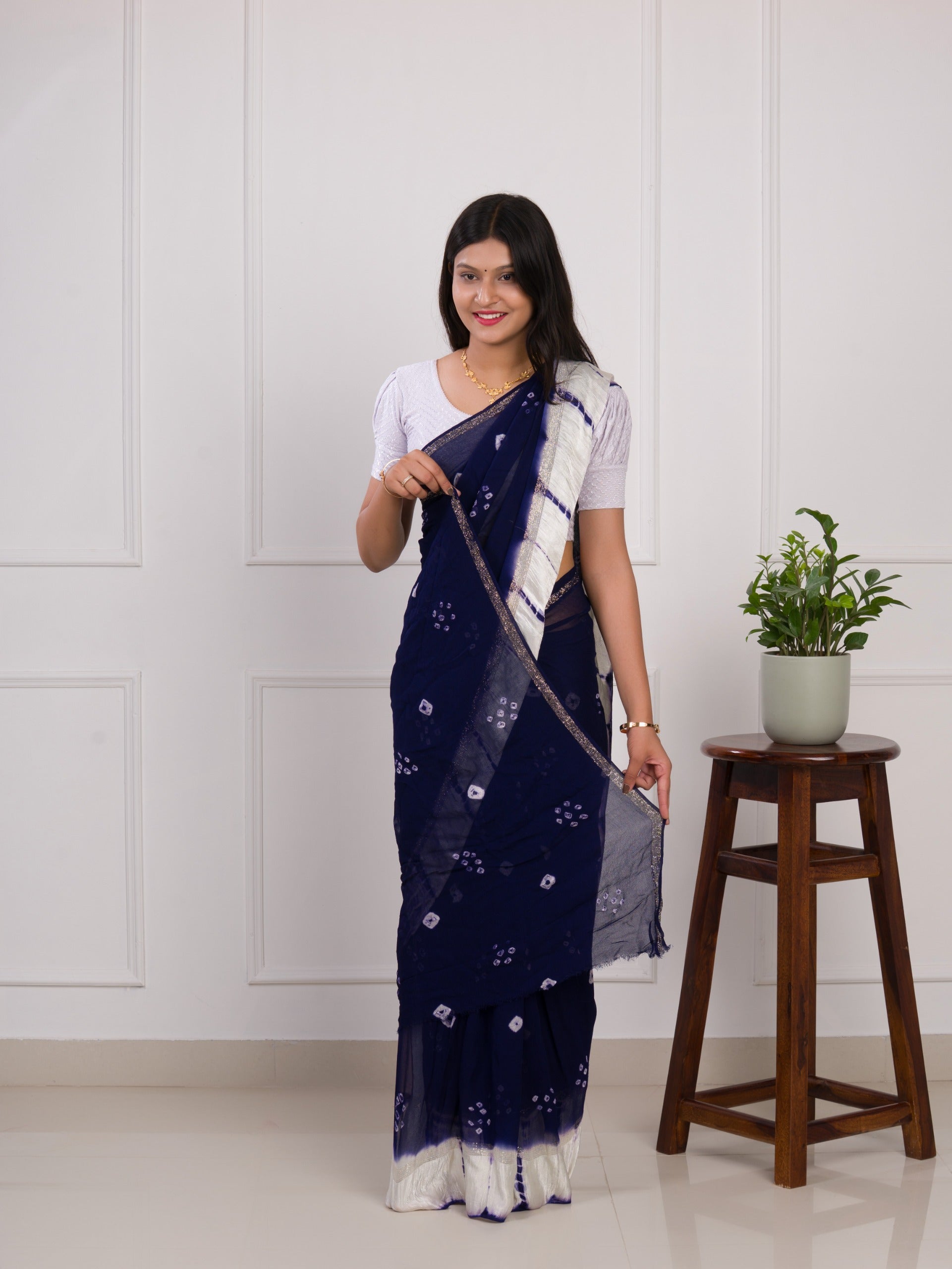 navy blue saree with white pattern with bandhani style