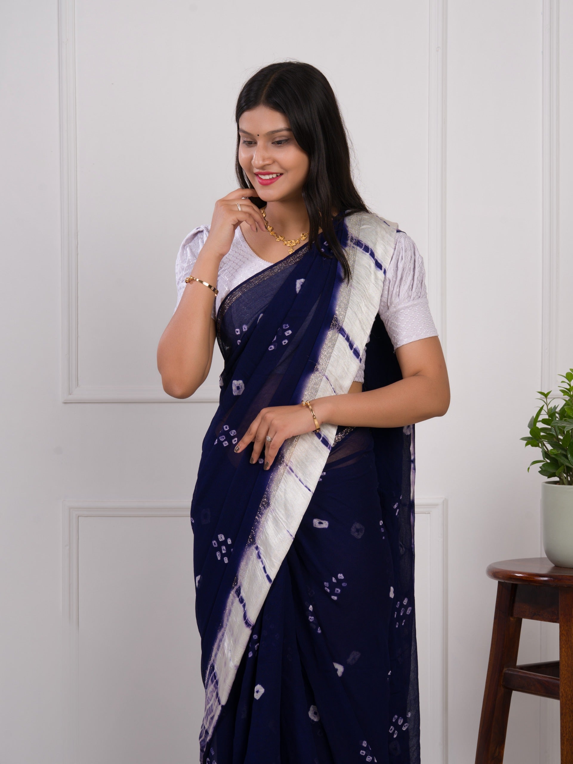 navy blue saree with white pattern with bandhani style