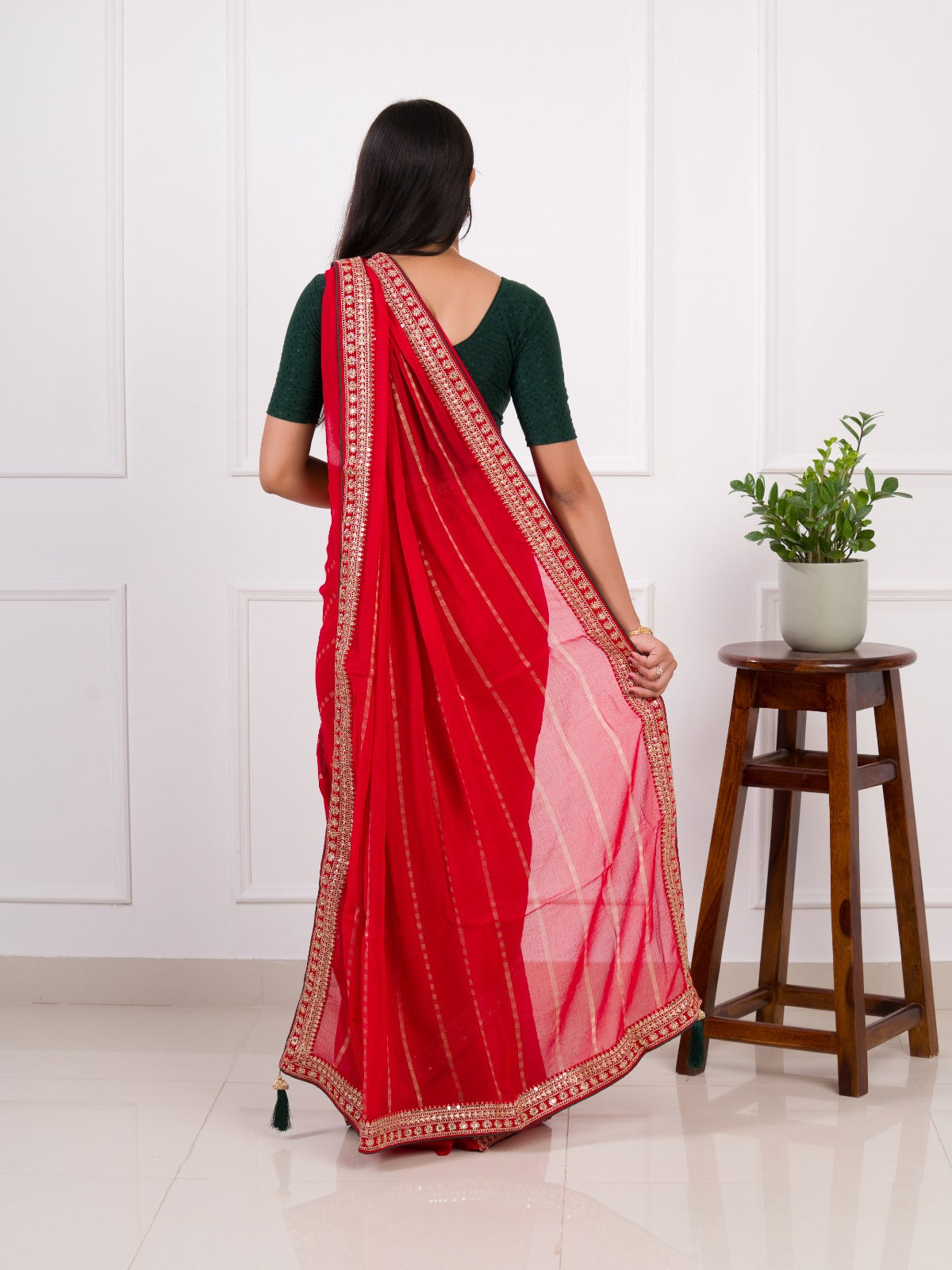 Red saree with gold border