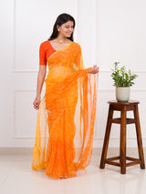 orange saree with a white printChiffon Bandhani style With Vintage Work Saree