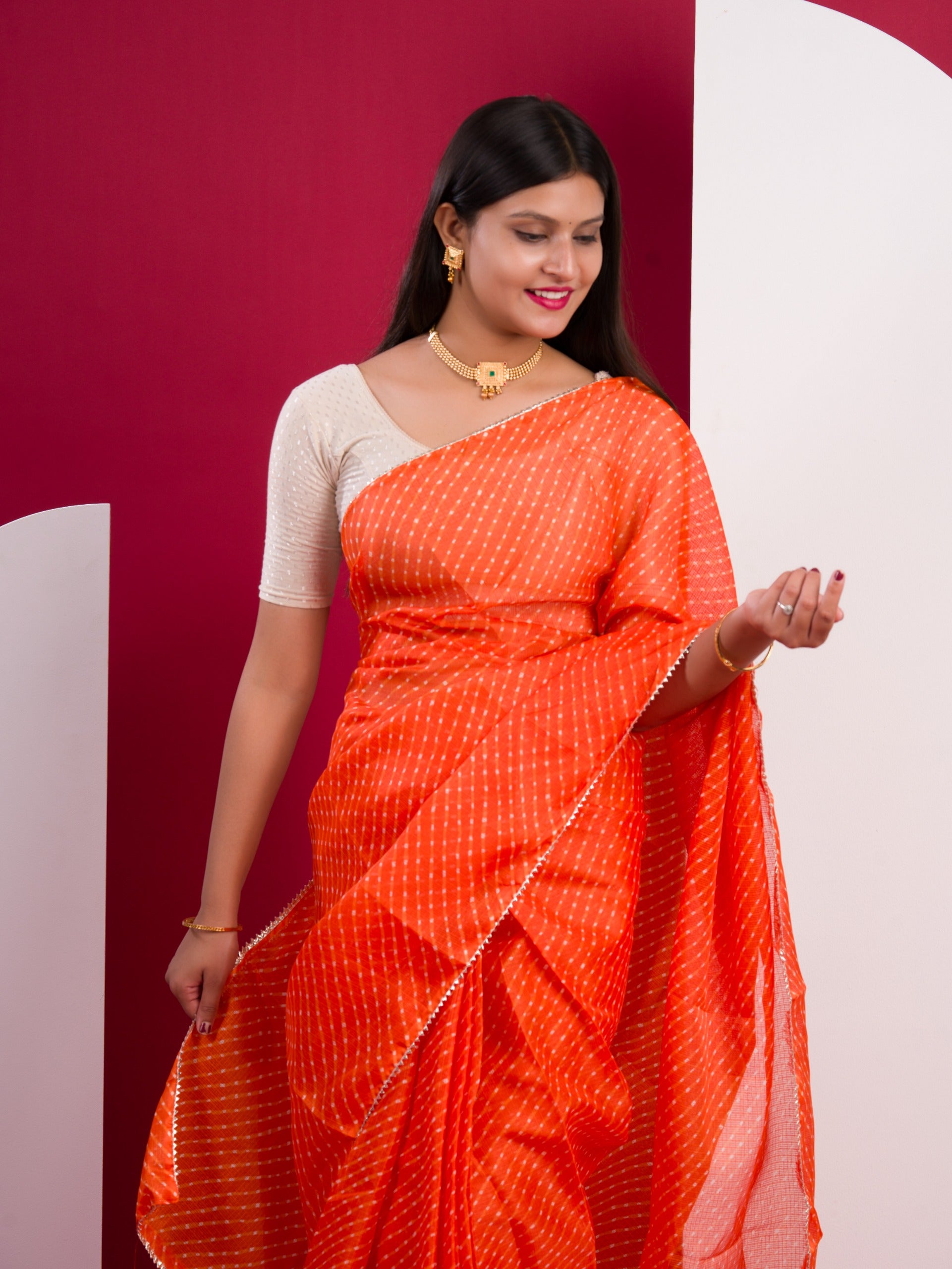 Kota Doria Saree in orange colour under 1000