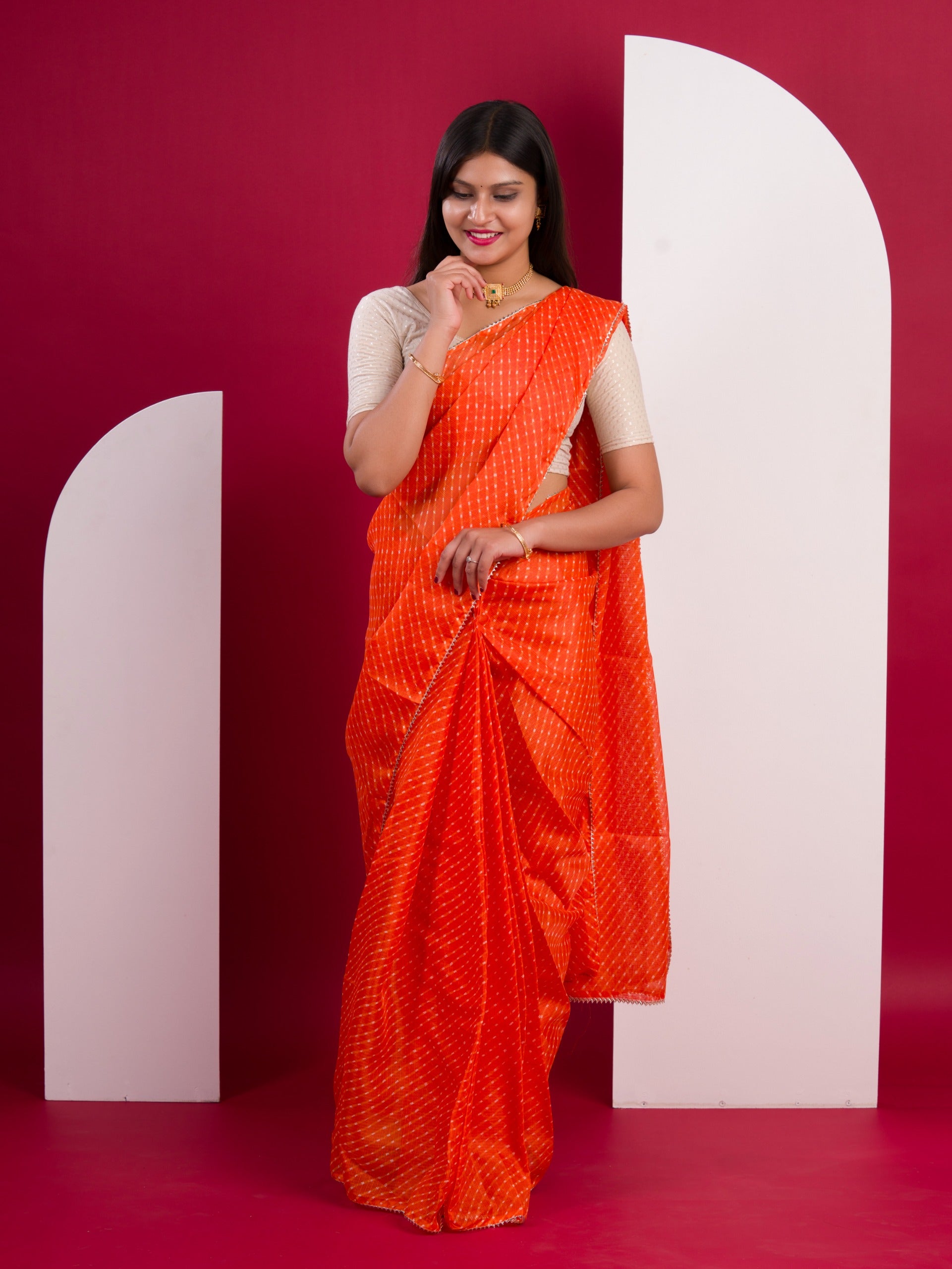 Kota Doria Saree in orange colour under 1000