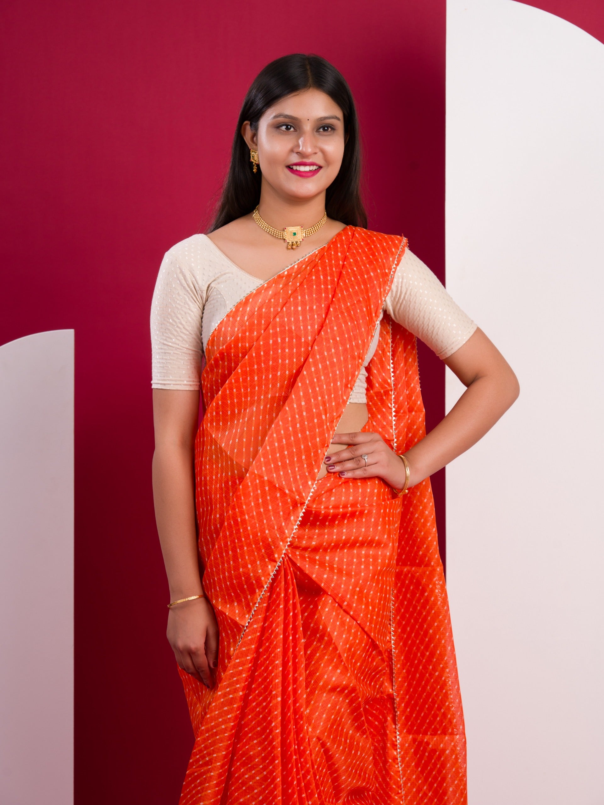 Kota Doria Saree in orange colour under 1000