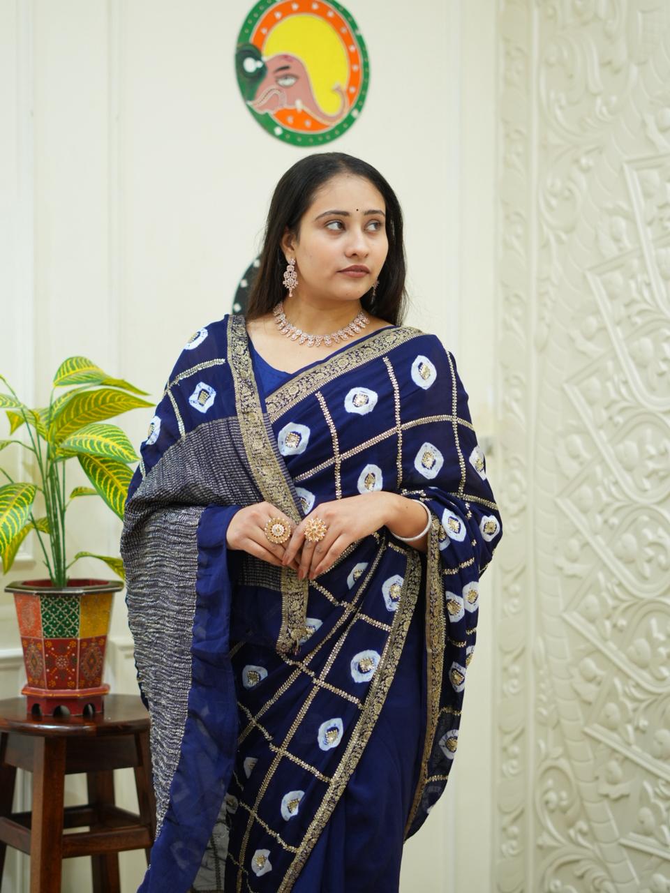 KcPc New Elegant Banarasi Georgette Saree Adorned with Intricate Tari Embroidery PRF