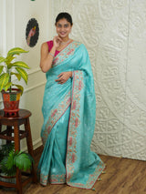 By sea green Banarasi silk saree with sequence embroidery work in a floral pattern KcPc