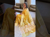 tissue silk Banarasi saree with zari weaving, in orange and yellow colors