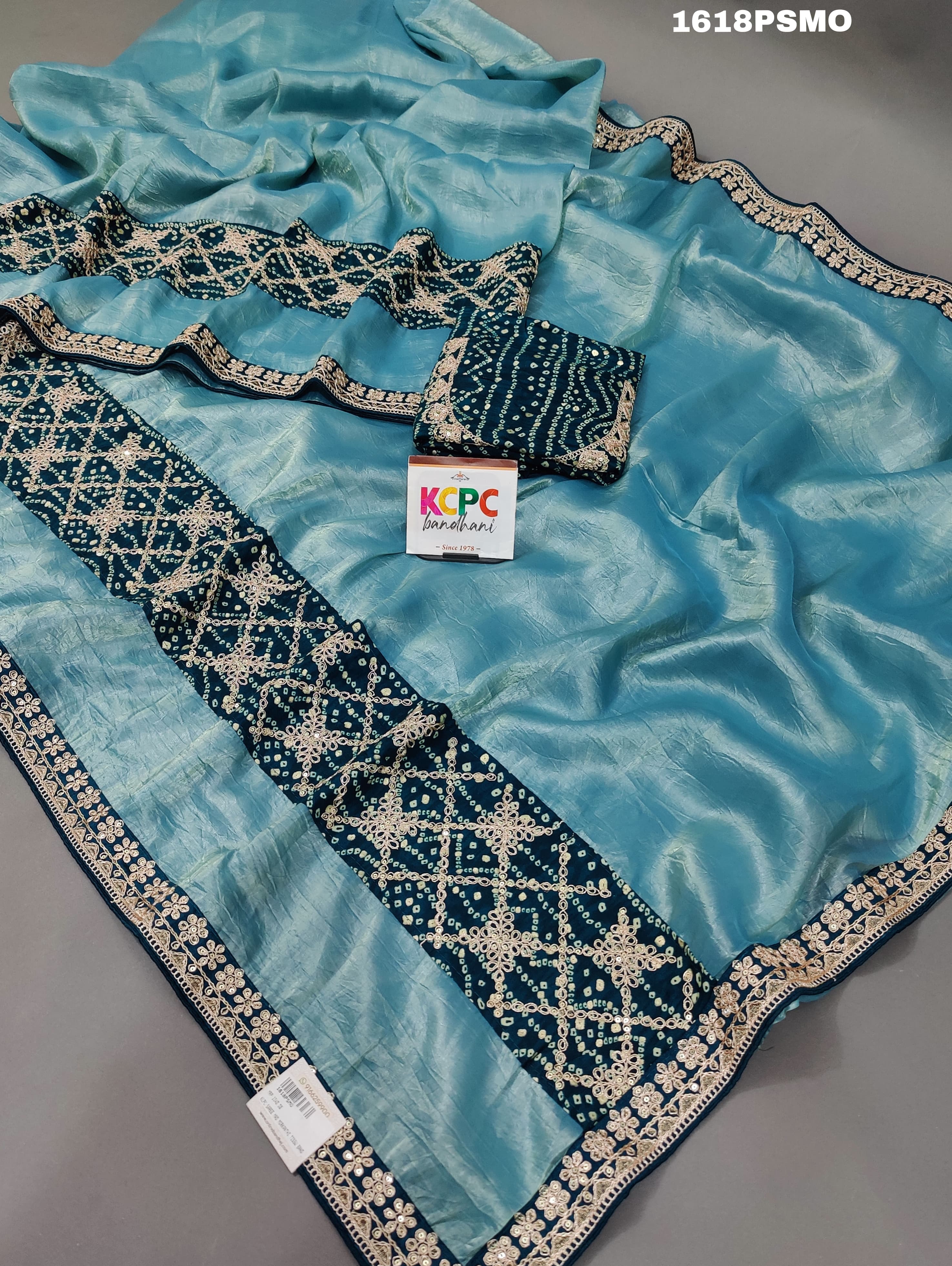 Ablue banarsi handloom bandhani saree with zari thread border and gota patti work,