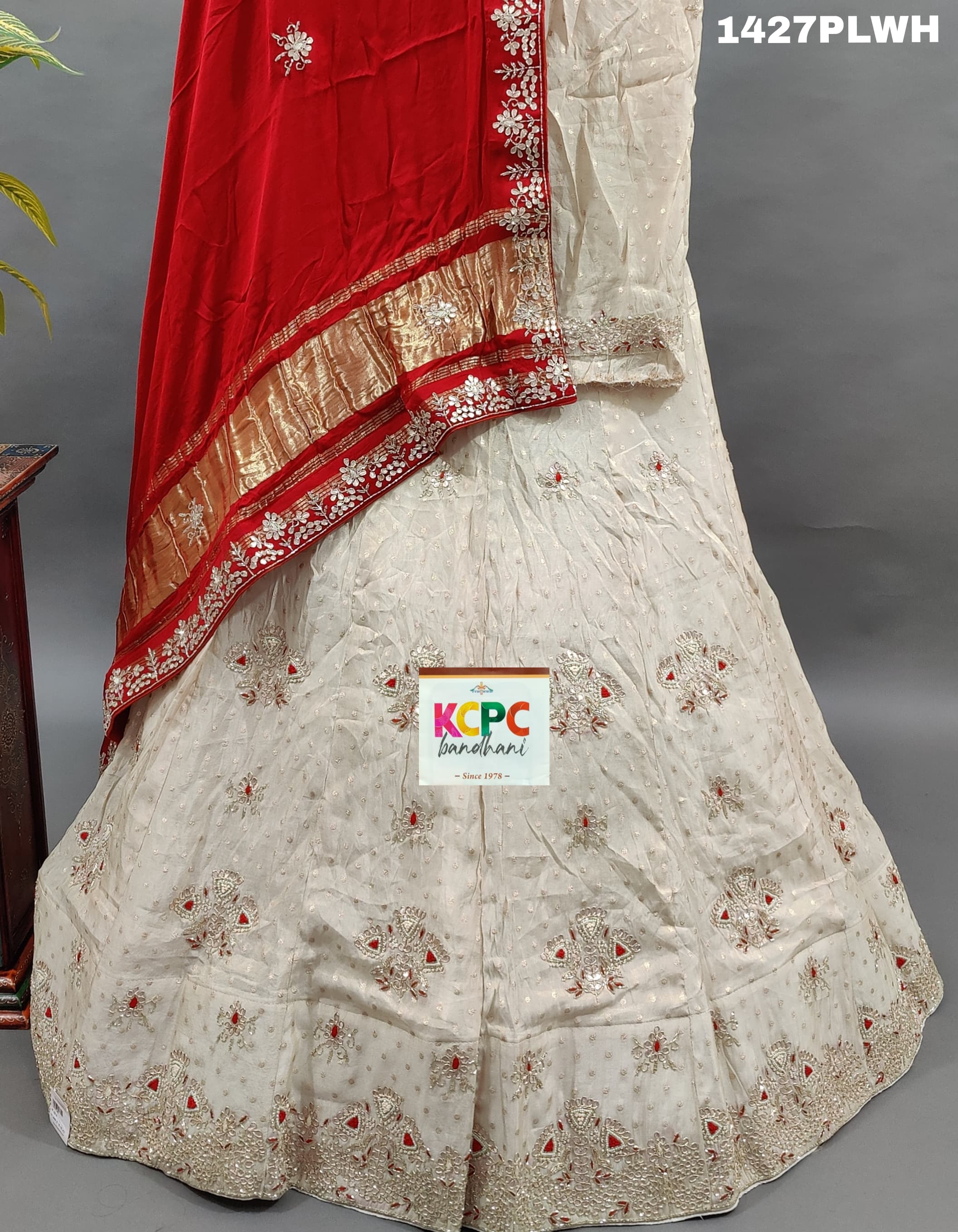 A pure upada silk lehenga with red Gaji silk dupatta