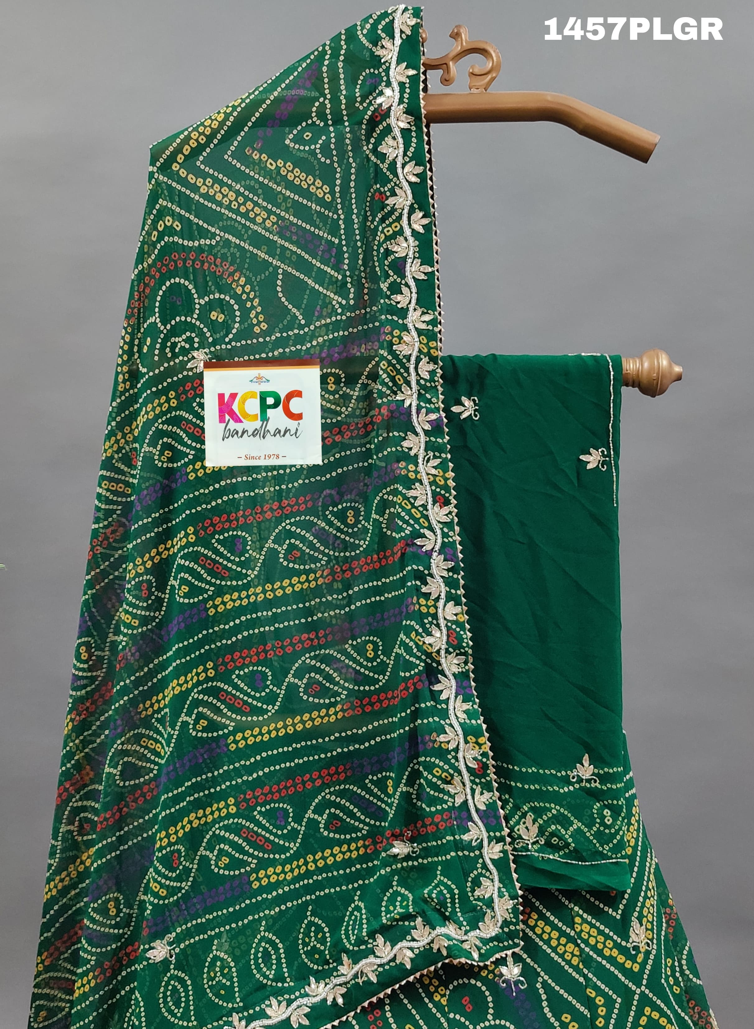 A traditional green lehenga with gotapati work