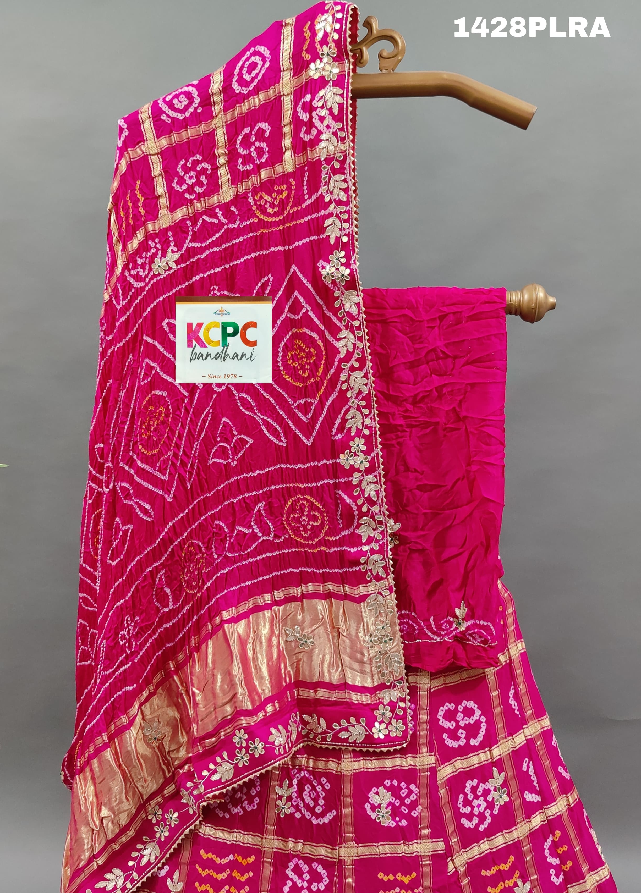 A pink pure Gaji silk lehenga with Gota Patti work