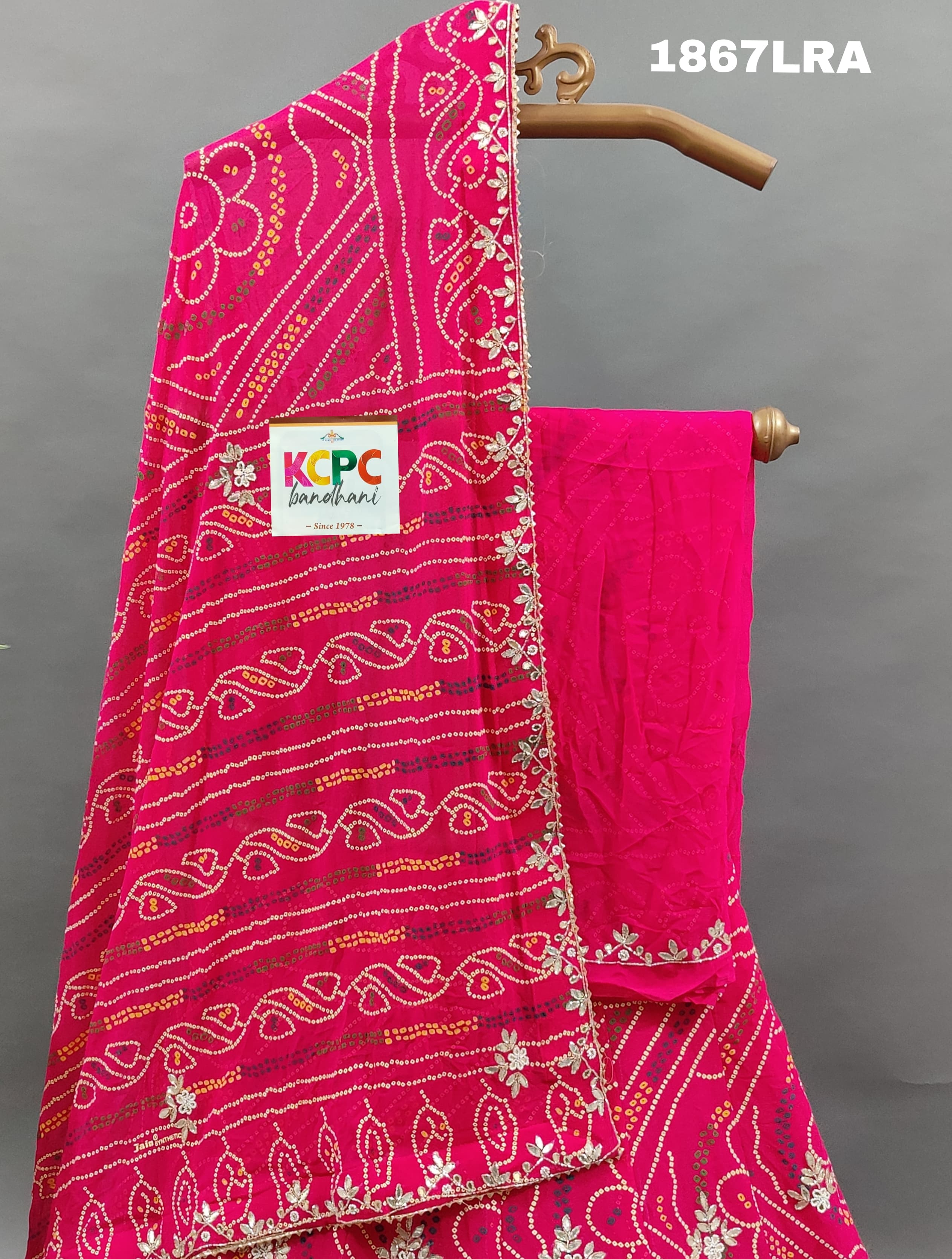 A pink georgette bandhej lehenga with cutdana gotapatti work
