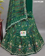 A traditional green lehenga with gotapati work