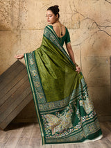 A green saree with Silk Printed Style With Zari Border Work