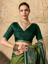 A green saree with Silk Printed Style With Zari Border Work