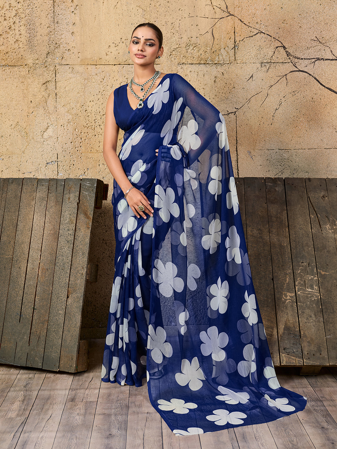  Georgette Flower Printed Style Saree in blue colour under 1000
