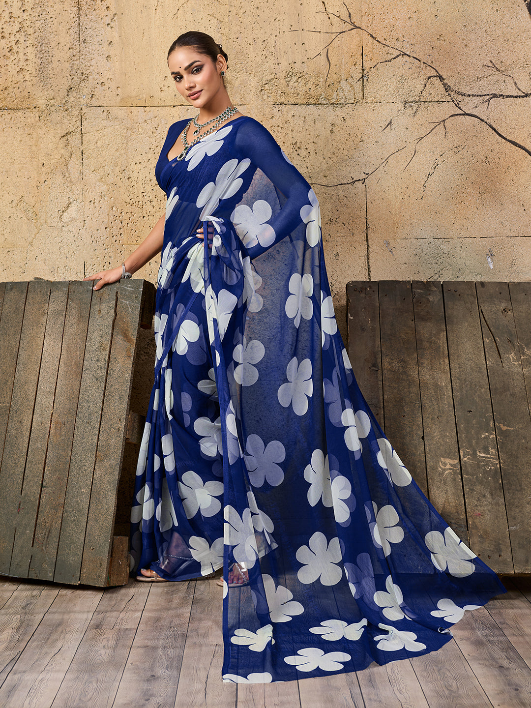  Georgette Flower Printed Style Saree in blue colour under 1000