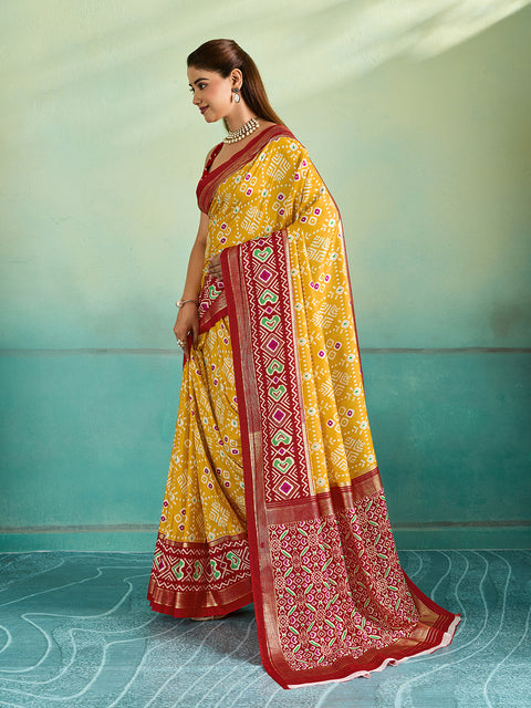  A yellow and red pashmina cotton silk saree with a patola style pattern 