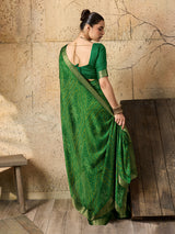 A green bandhani style chiffon georgette saree with a golden border and a matching green blouse piece, 