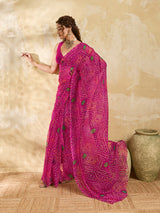 A rani colour geometric patterned saree with bandhani style dots under 500