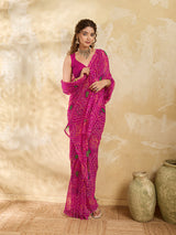 A rani colour geometric patterned saree with bandhani style dots under 500