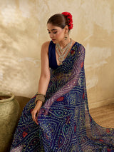 A blue colour geometric patterned saree with bandhani style dots under 500
