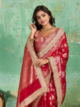 Woman in a red saree with gold borderTissue silk Banarasi Style 