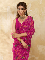 A rani colour geometric patterned saree with bandhani style dots under 500