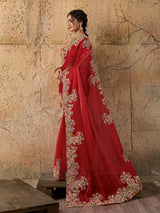 A red saree with floral embroidery 
