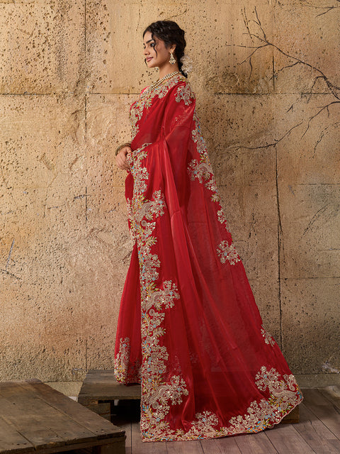 A red saree with floral embroidery 