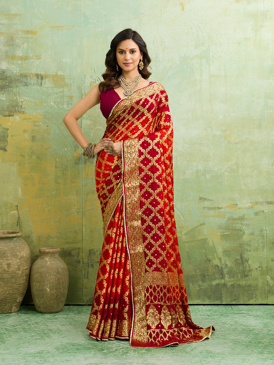  Banarasi silk saree with heavy zari work in orange and red color, with a traditional gharcholastyle 
