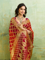 Banarasi silk saree with heavy zari work in orange and red color, with a traditional gharcholastyle 