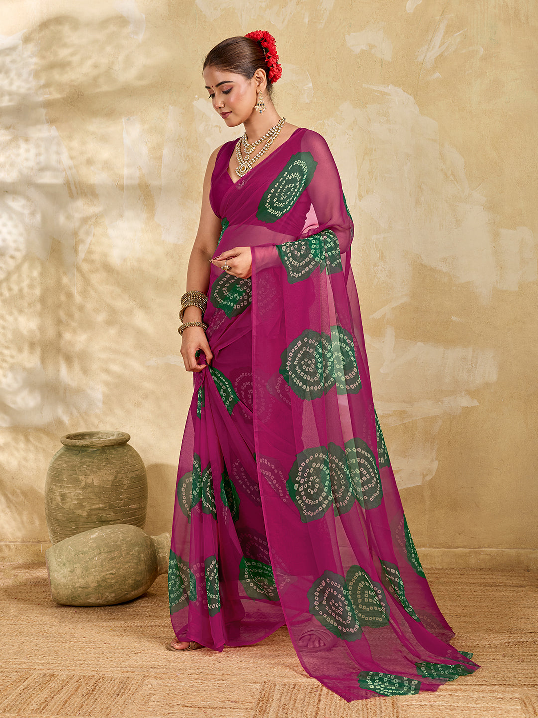  A bright pink saree with bandhani print under 500