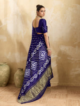 Buy blue saree with bandhani print and lagdi patola pallu