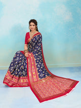  A blue and red pashmina cotton silk saree with a patola style pattern 