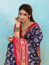  A blue and red pashmina cotton silk saree with a patola style pattern 