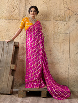 A party wear saree in Rani colour