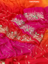 A pink, orange, and gold chiffon saree with Mukesh work 
