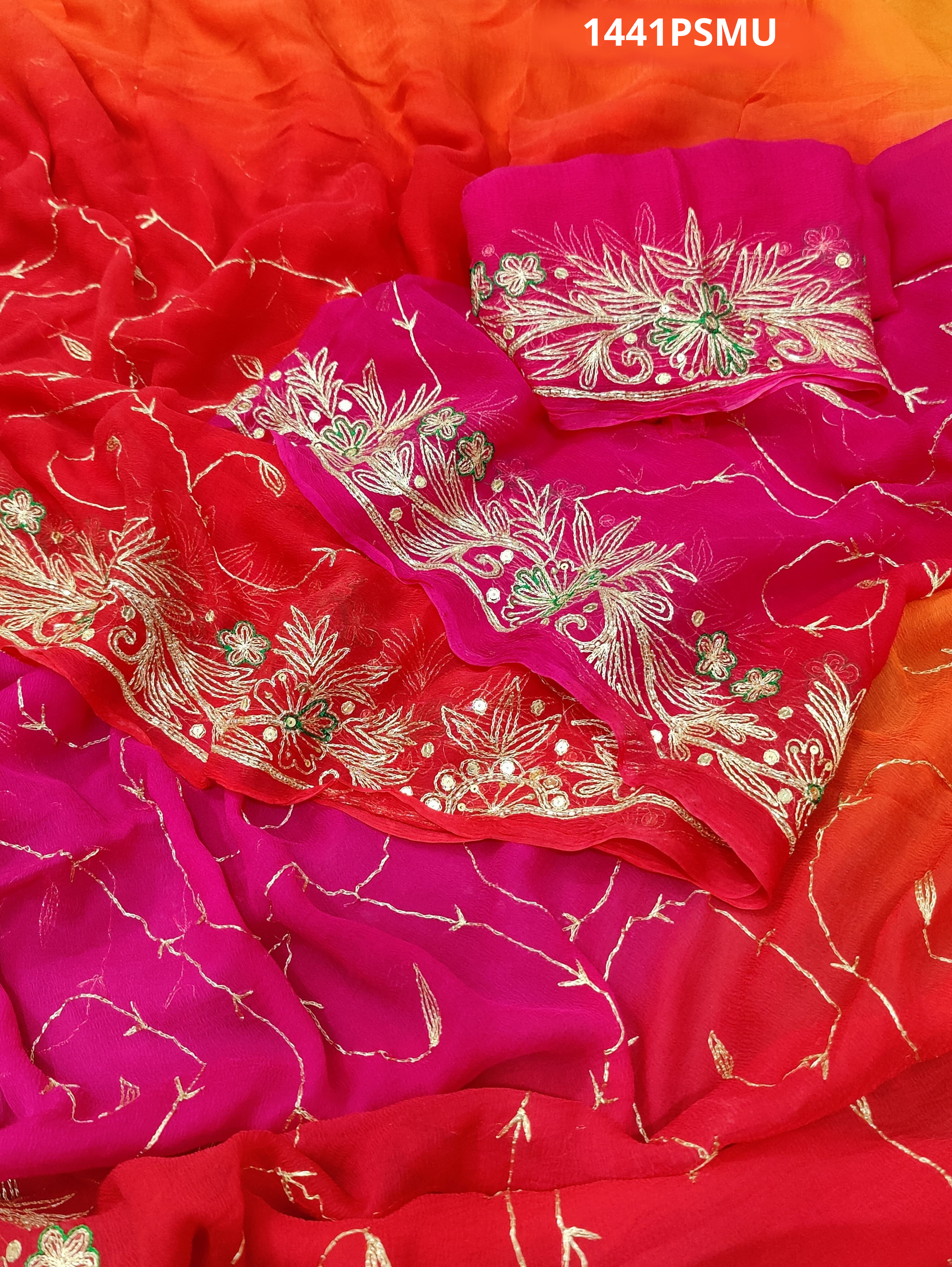 A pink, orange, and gold chiffon saree with Mukesh work 